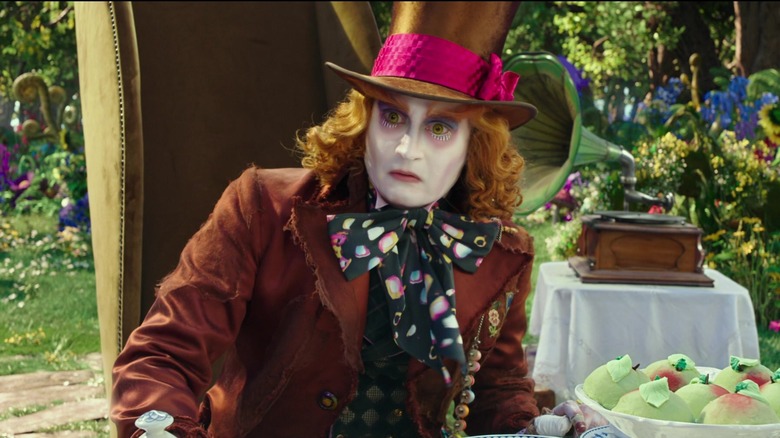 Mad Hatter looks toward left