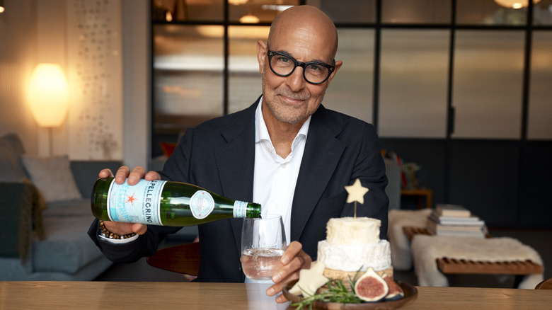 stanley tucci pouring s. pellegrino